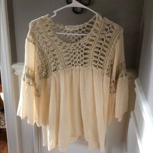 Cream crotchet blouse.